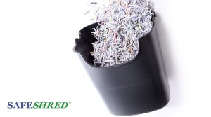 Container full of shredded paper knocked over