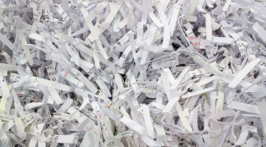 Purge shredding is a one-time, comprehensive process for destroying large volumes of paper documents. It ensures that sensitive information is completely obliterated, protecting against identity theft, data breaches, and other security threats. Let's explore seven critical scenarios where purge shredding is essential.